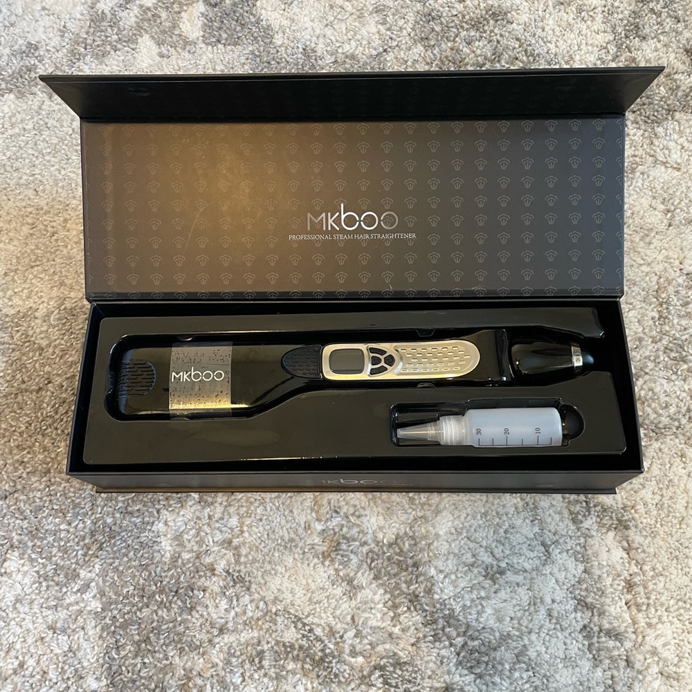 • PROFESSIONAL STEAM HAIR STRAIGHTENER •
